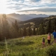 family hiking at sunset at black powder pass